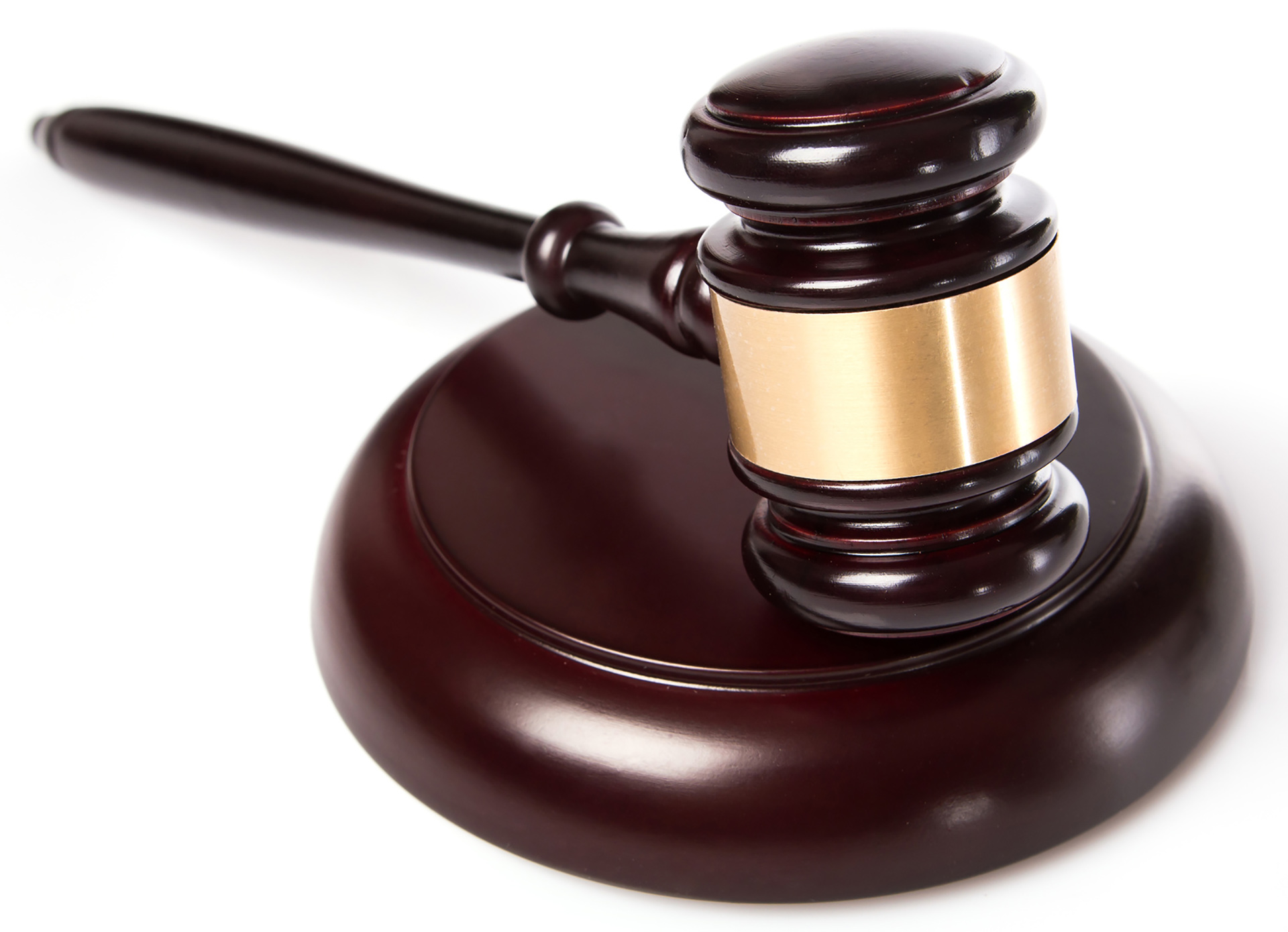 Grafika przedstawia młotek sędziowski. 